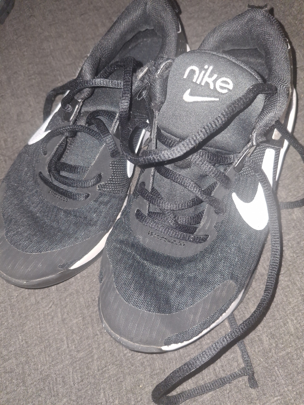 Nike Kids Black Sneakers with White Swoosh